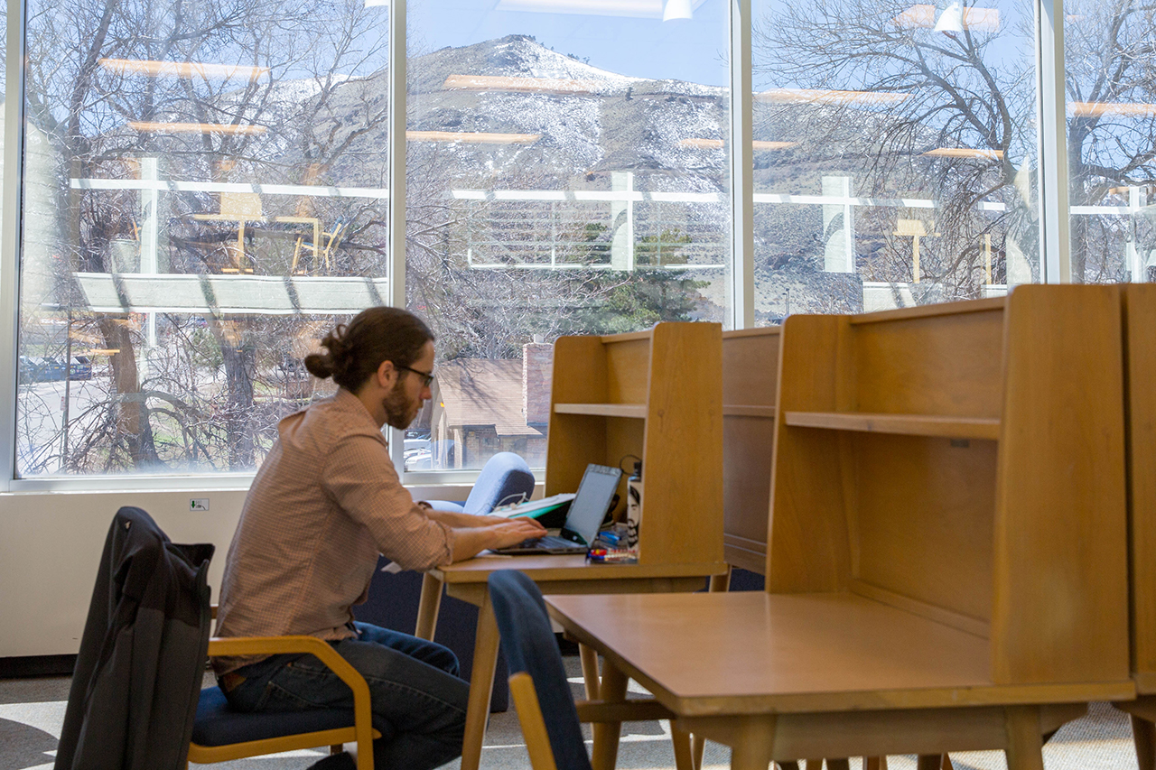 Student studying in Mines Library
